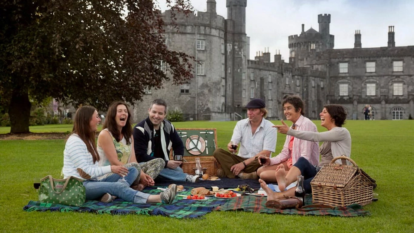 Group of friends having at picnic at Kilkenny Castle, Co_Web Size