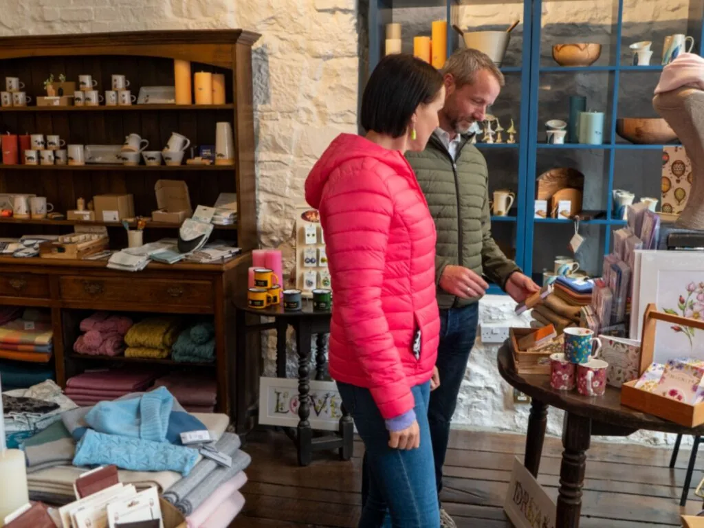 a couple browsing the shop